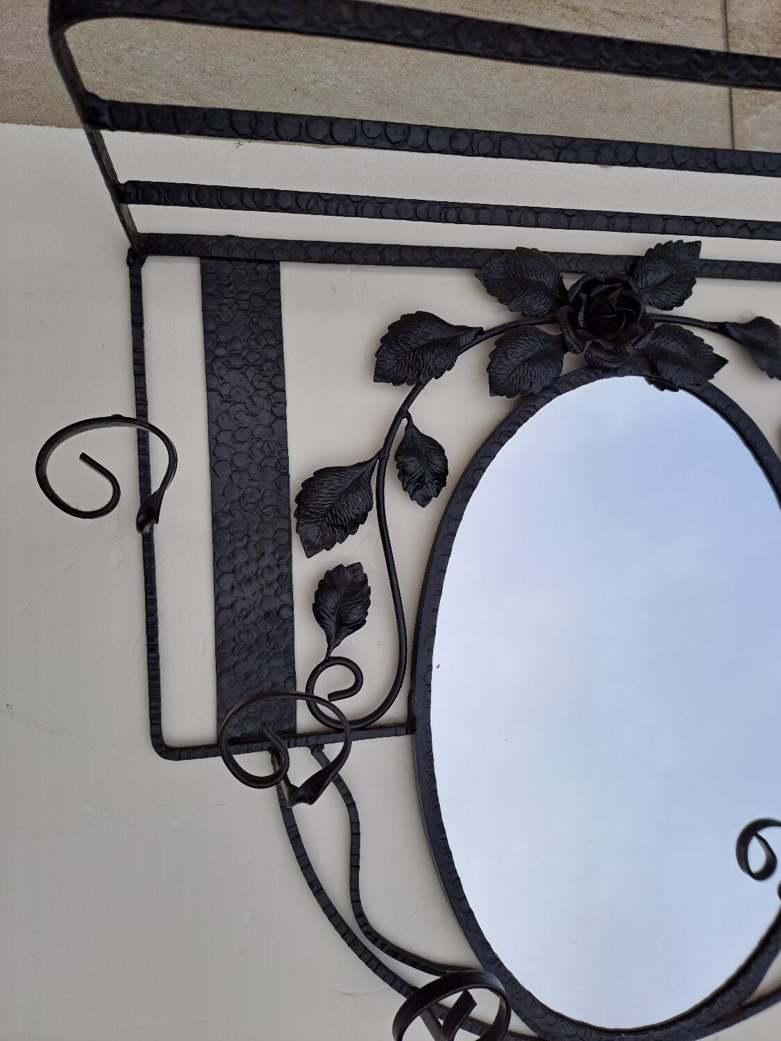 Wrought iron wall coat rack