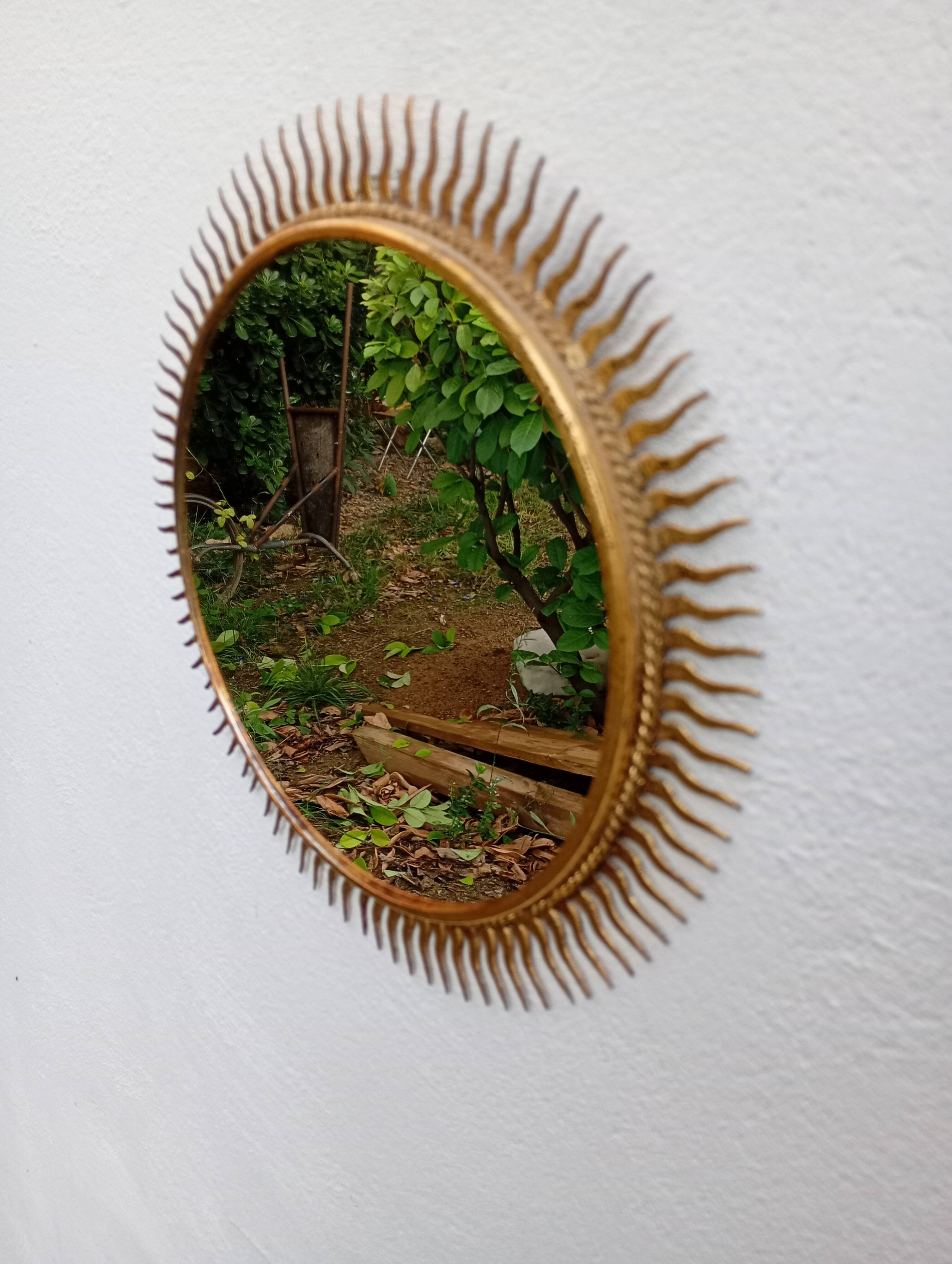 Miroir soleil vintage doré en métal – style années 60/70