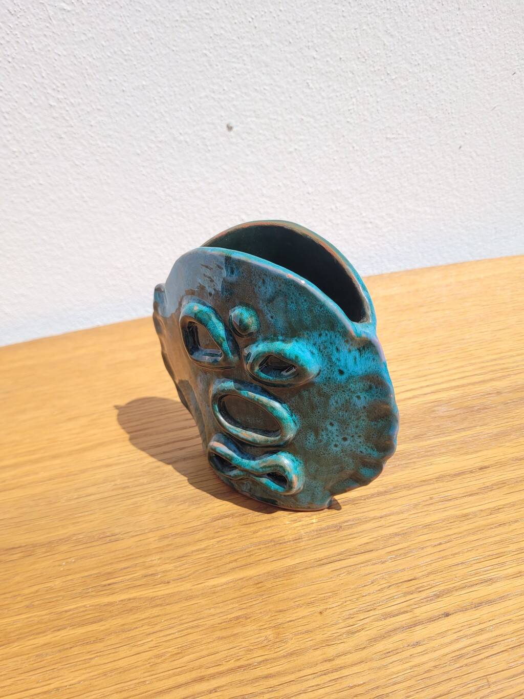 Turquoise glazed terracotta ceramic vase