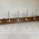 Wooden school coat rack with six double hooks