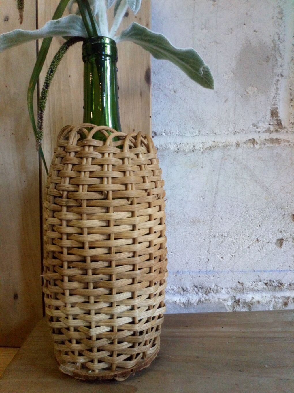 Bottle in a rattan basketry 50s