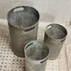 Vintage set of perforated metal waste bins