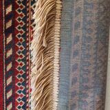 Wall rug with oriental patterns.