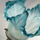Pair of wall lights with porcelain feet and blue glass tulips in Art Deco style.