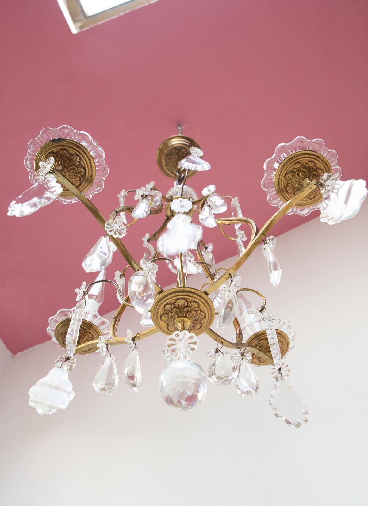 Old French chandelier in gilded brass with tassels