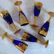 12 cobalt blue and gold Murano glass flutes, mid-20th century.