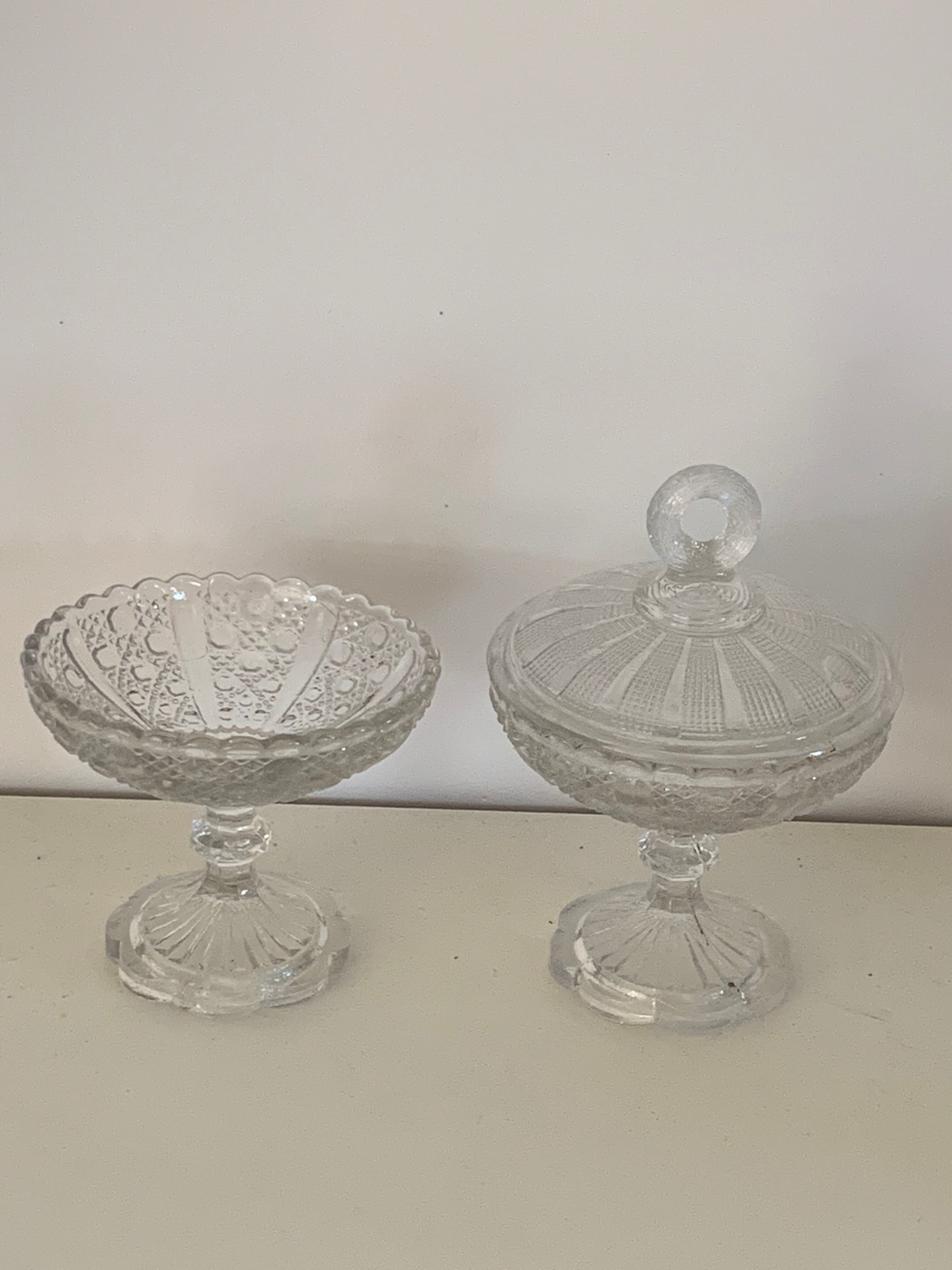 Two dredged cups in transparent glass geometric patterns in old relief