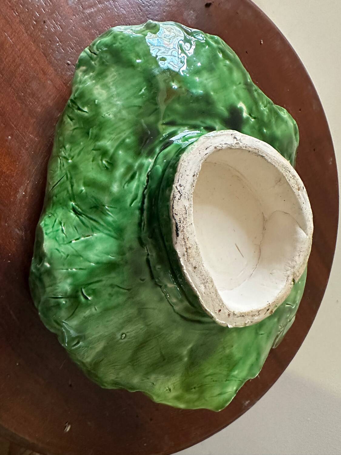 Vintage ceramic leaf-shaped vide poche, signed.