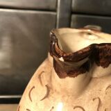 Ceramic pitcher with floral decoration signed Lucq