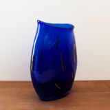 Blue blown glass vase and orange inclusion