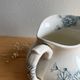 Old jug / pitcher with Daisy pattern from La Faïencerie Nouvelle in Givors.