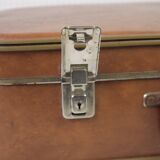 Cardboard and brown leather case