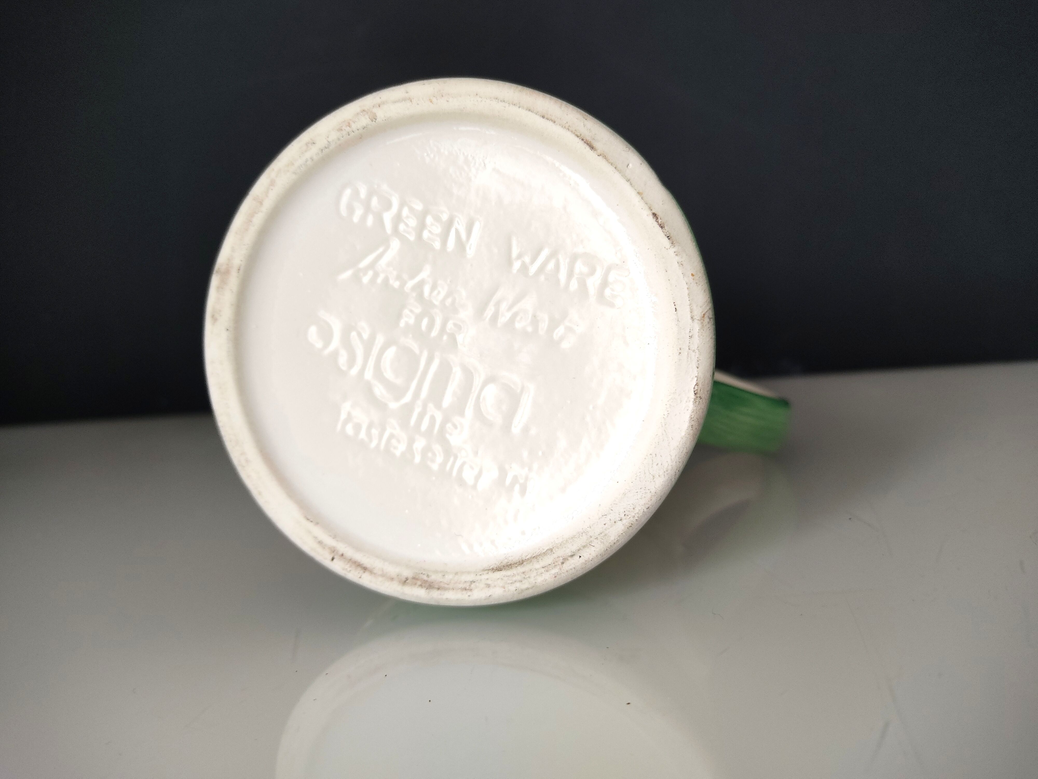 Andrea West rooster pitcher for Sigma