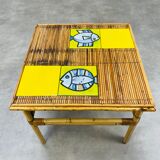 Table basse Roger Capron en céramique et rotin, modèle aux poissons