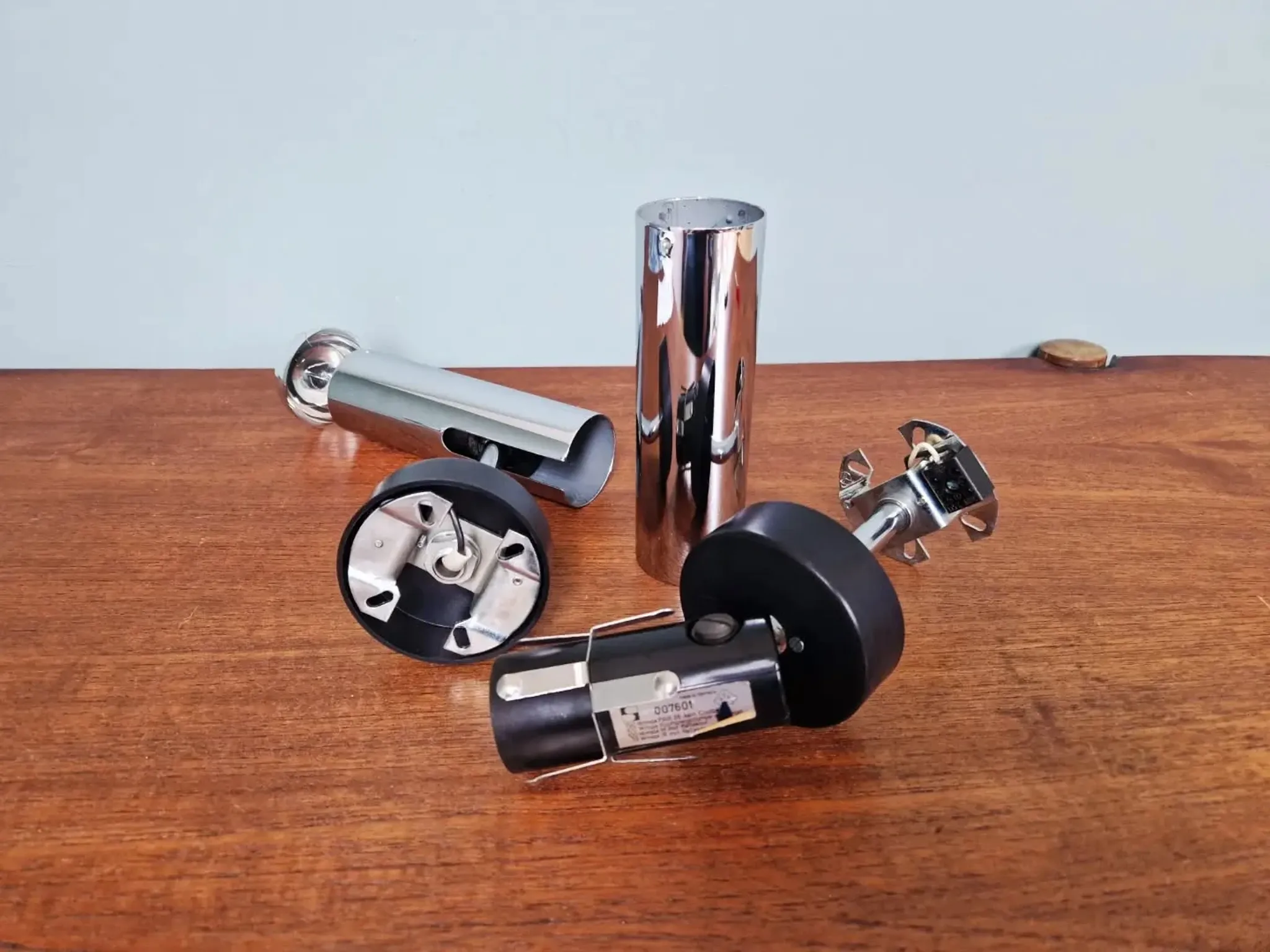 Pair of chrome metal wall lights, Staff Leuchten, Germany, 1970.