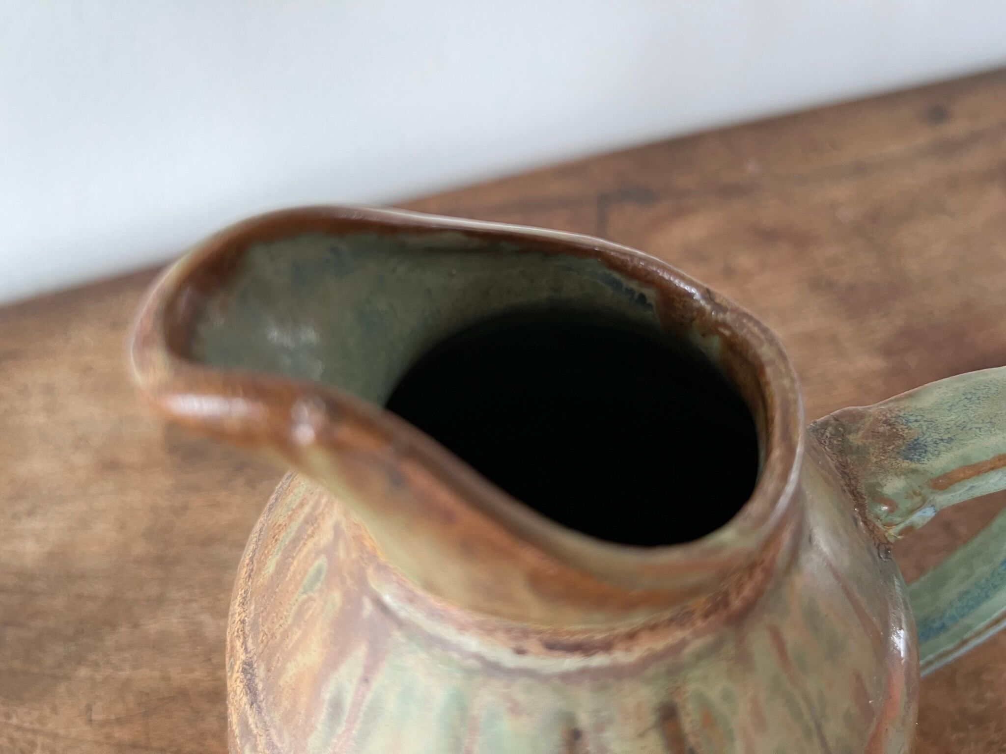 Pitcher in flamed sandstone