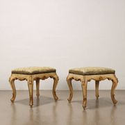Pair of antique baroque-style poufs in gilded wood, 19th century.