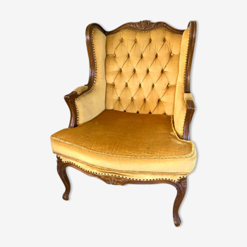 Fauteuil bergère velours jaune moutarde capitonné vintage