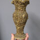 Vase covered with shells. Seaside souvenir.