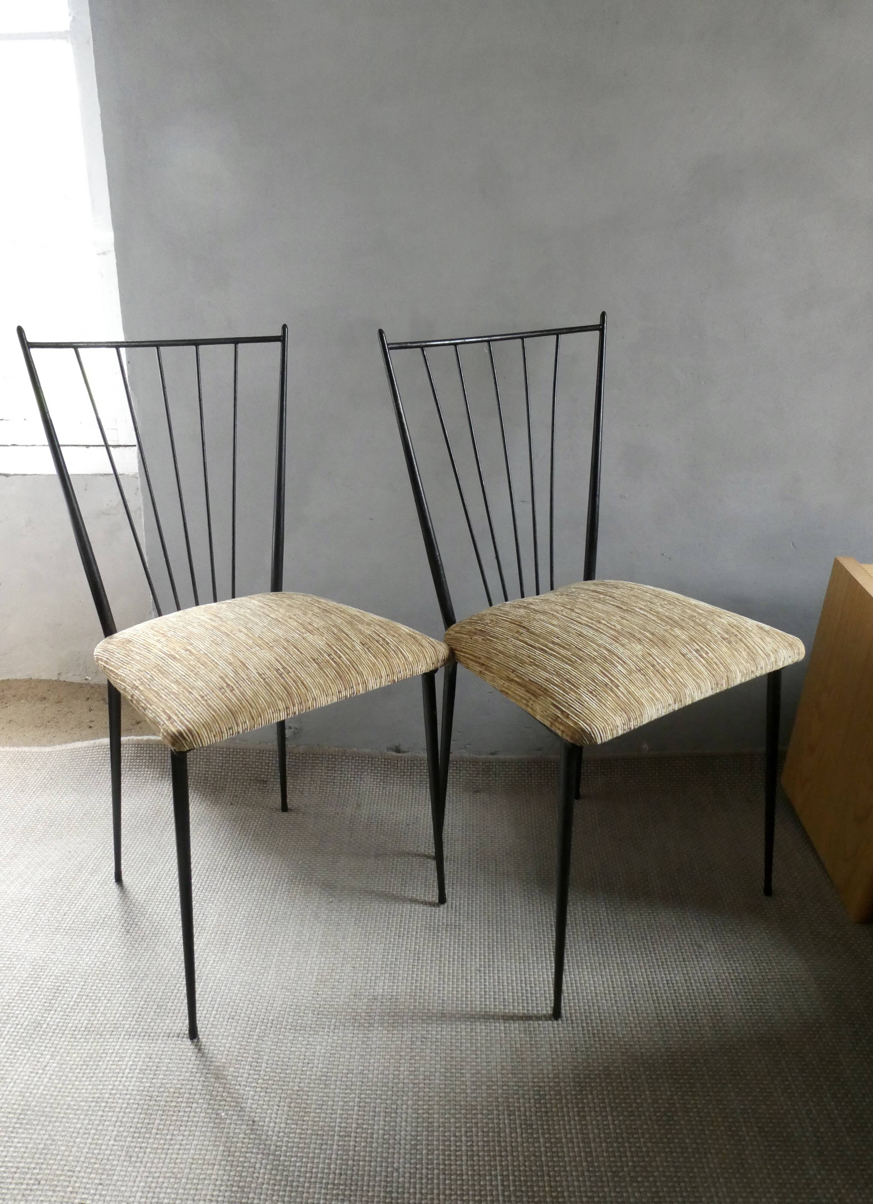 Pair of Colette Gueden chairs, black metal and fabric.