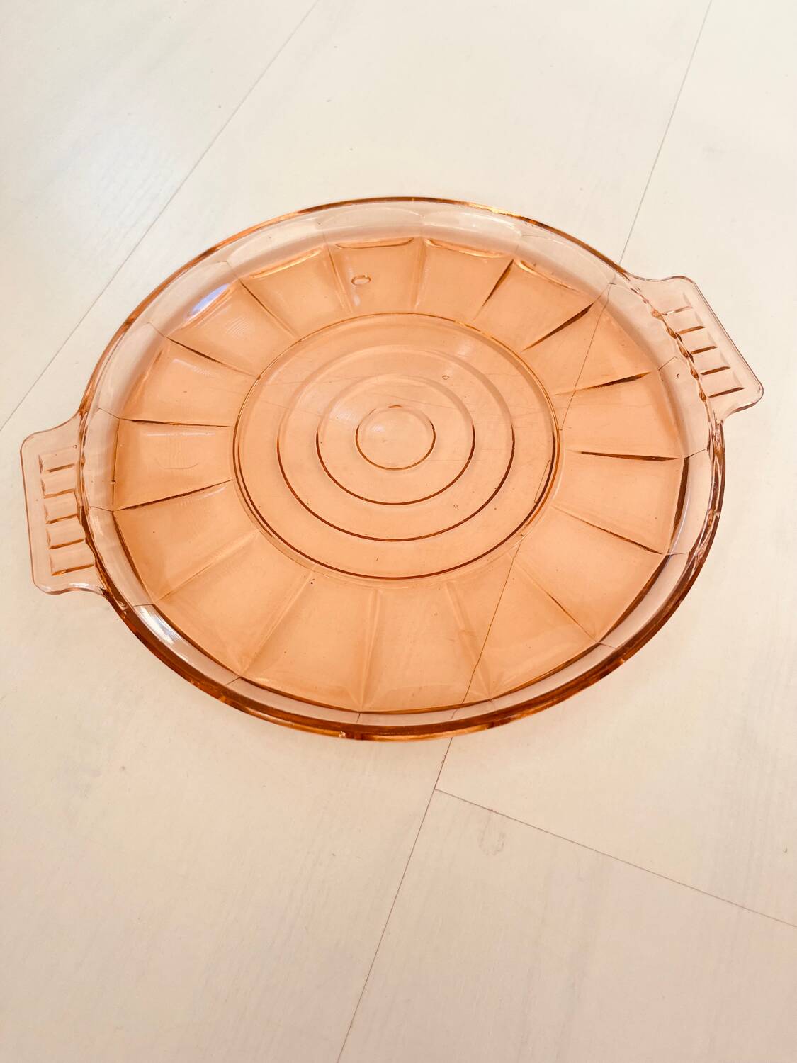 Round pink molded glass tray
