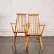 Set of 2 Windsor chairs with armrests.