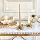 Pair of brass flower candle holders