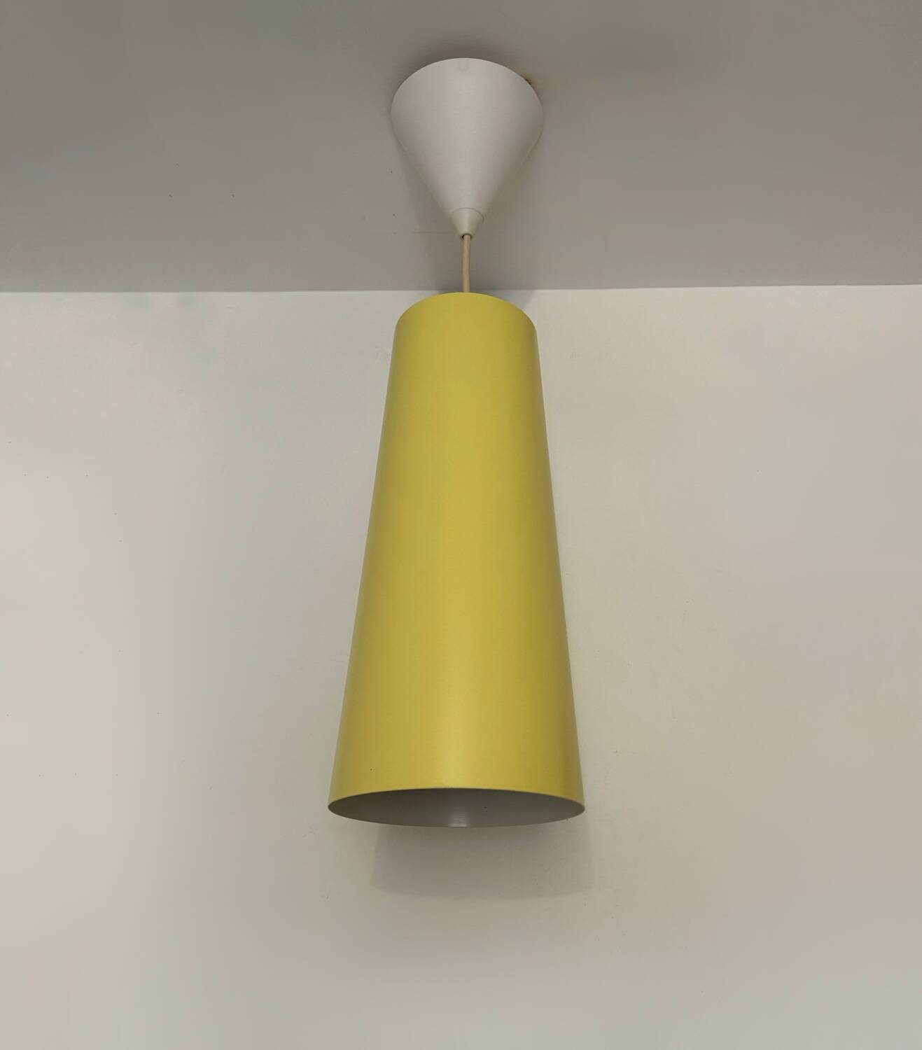IKEA yellow metal cylindrical pendant light from the 2000s