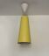 IKEA yellow metal cylindrical pendant light from the 2000s