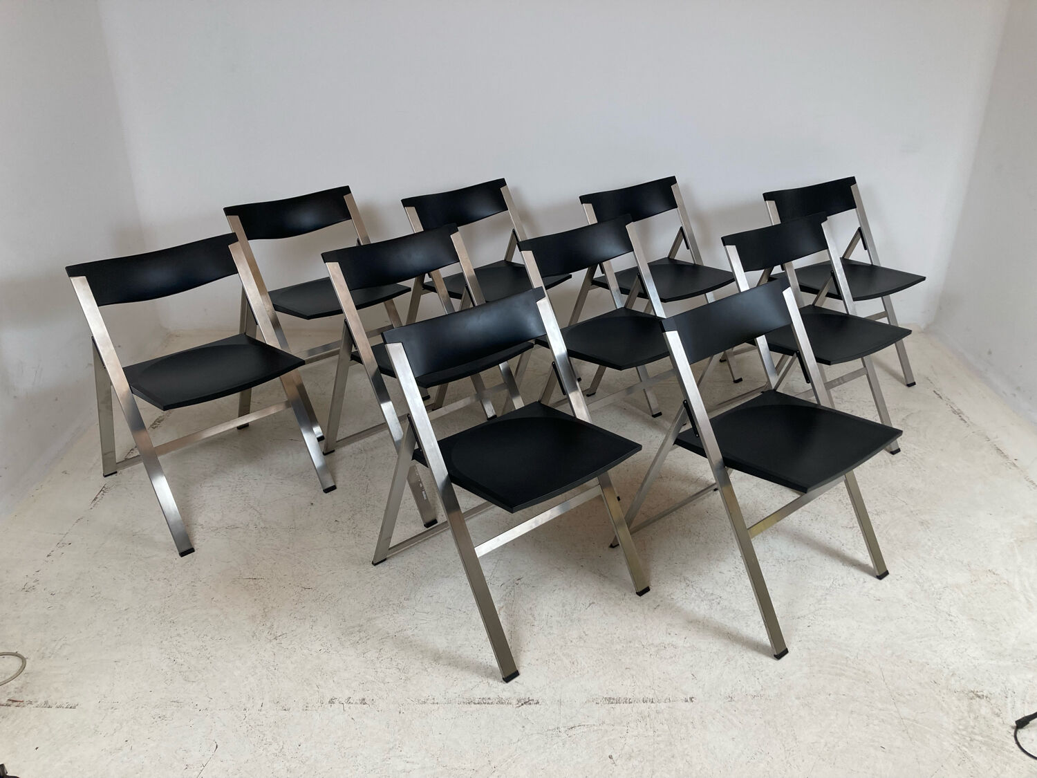 P08 folding chairs by Justus Kolberg for Tecno 1991
