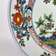 Delftware plate with gilded highlights, relief decoration, 18th century, 35 cm