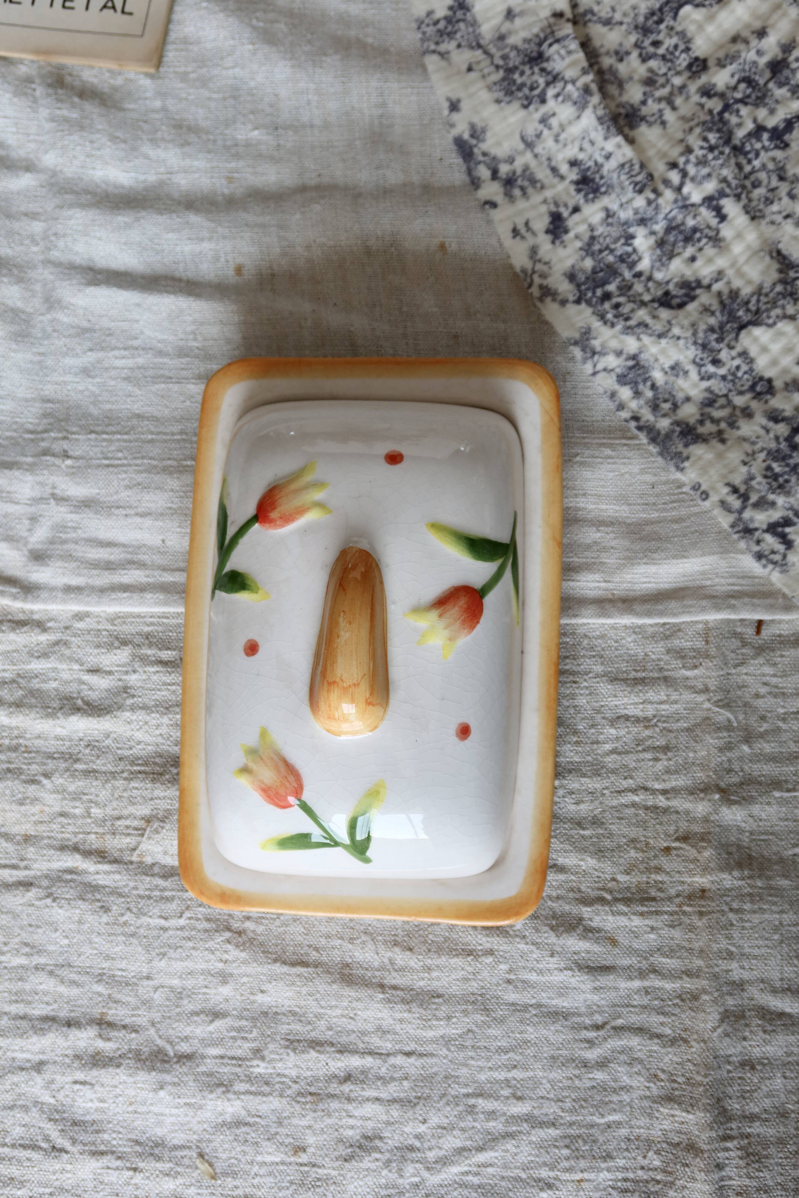 Vintage butter dish in earthenware and slip with tulip motif