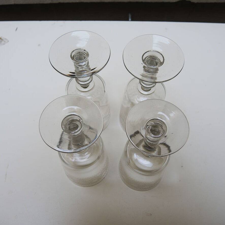 4 engraved transparent stemmed glasses by Baccarat