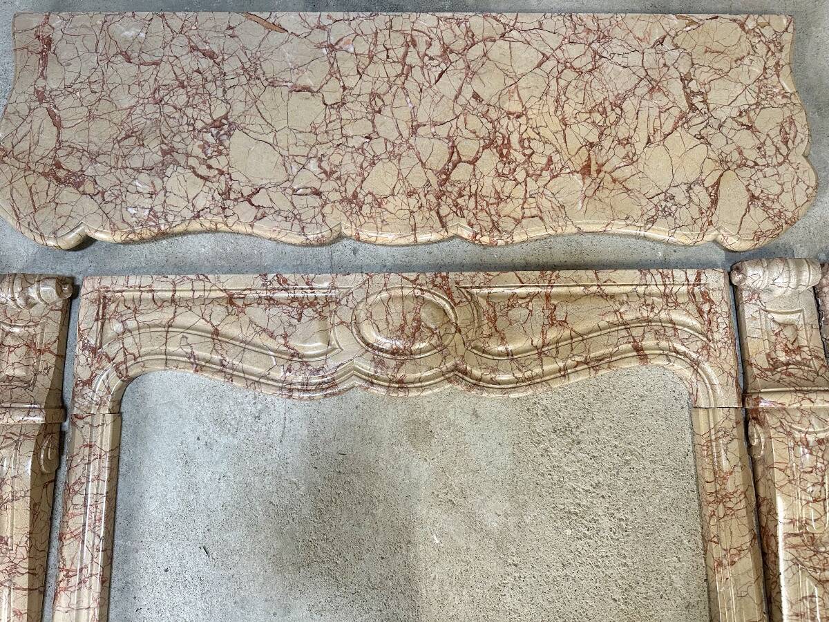 Pompadour fireplace in yellow Trets marble, Louis XV style, 19th century.