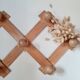 Wall-mounted accordion coat rack in solid pine