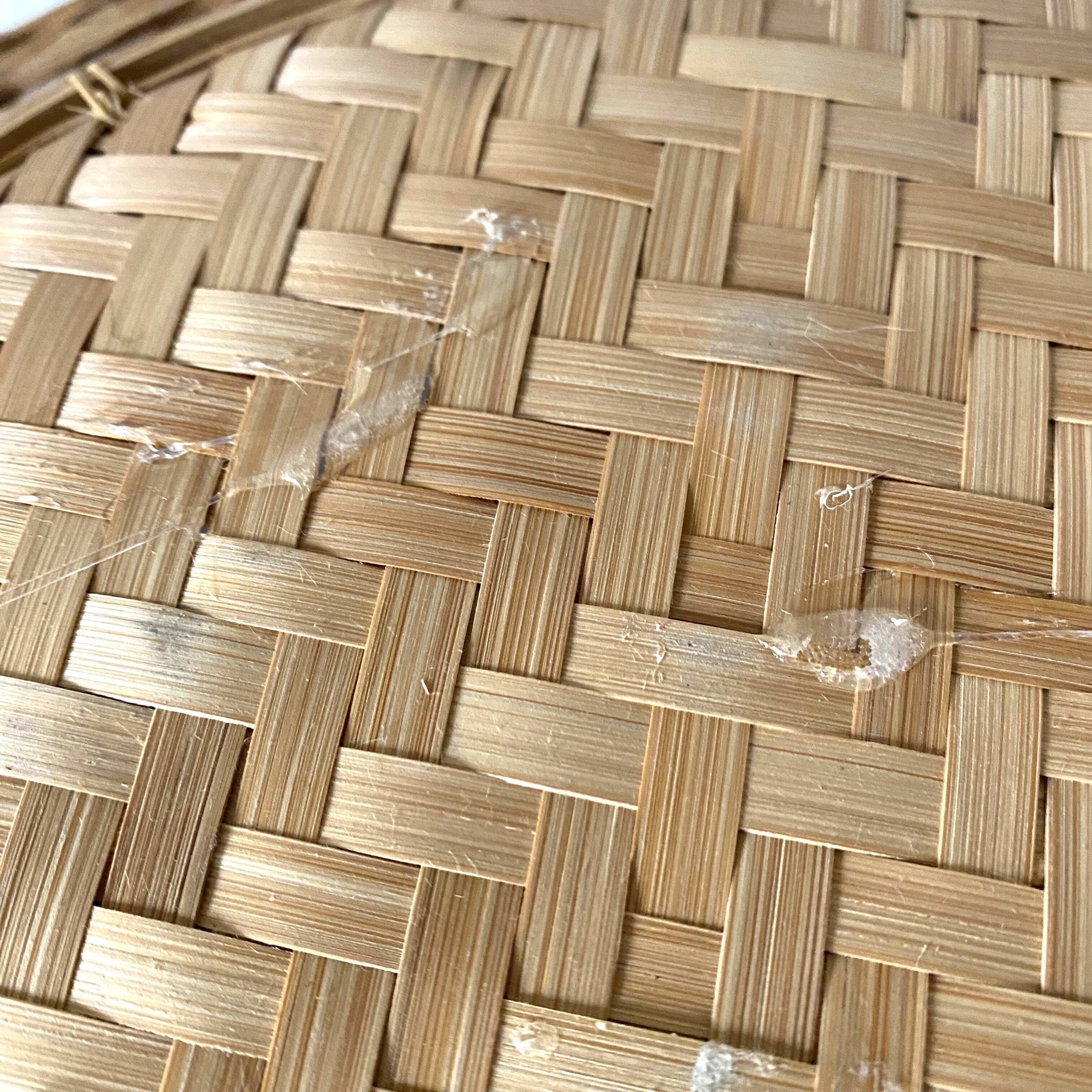 Round nesting trays in woven bamboo