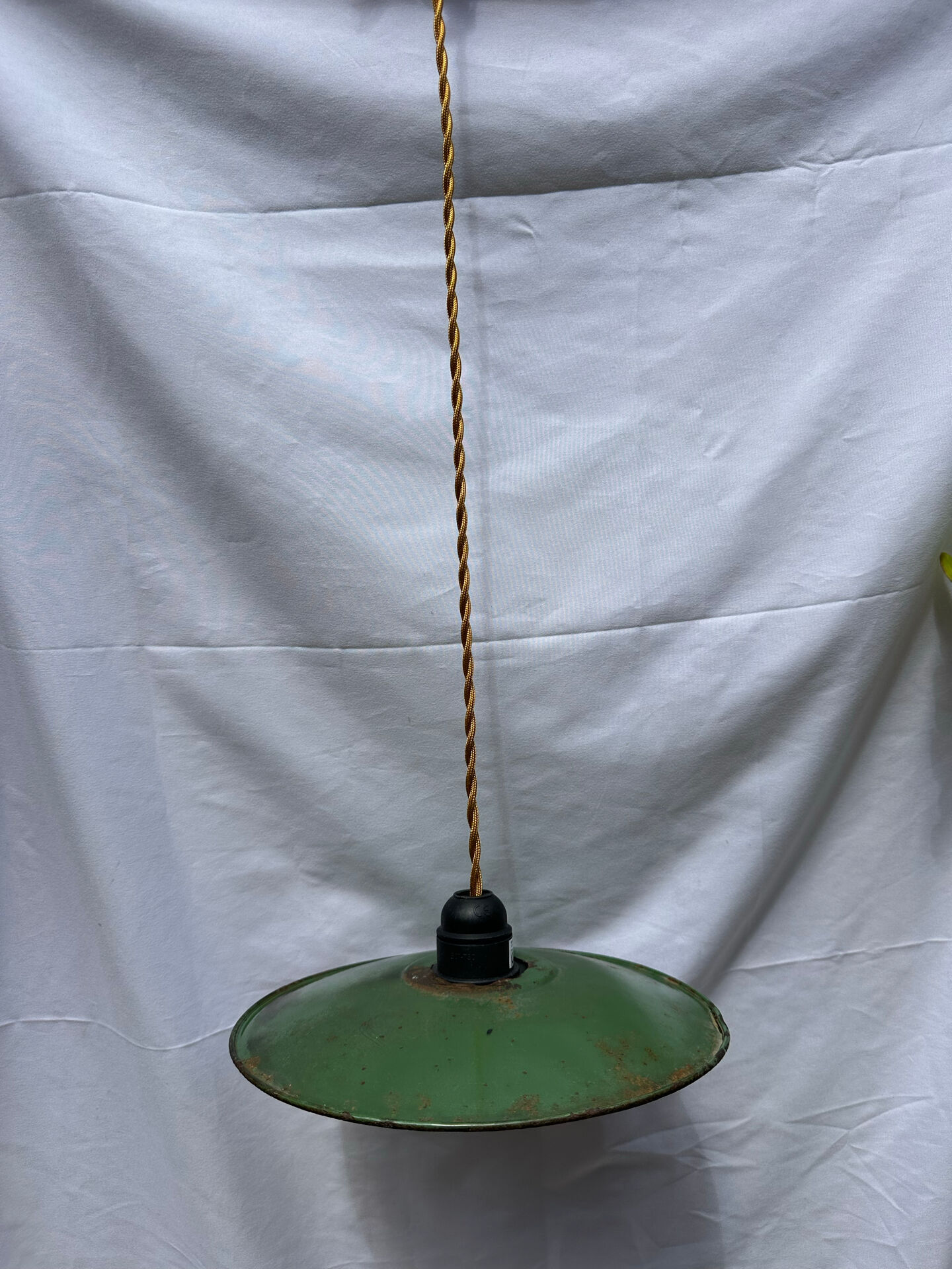 Old green and white enamelled sheet metal suspension