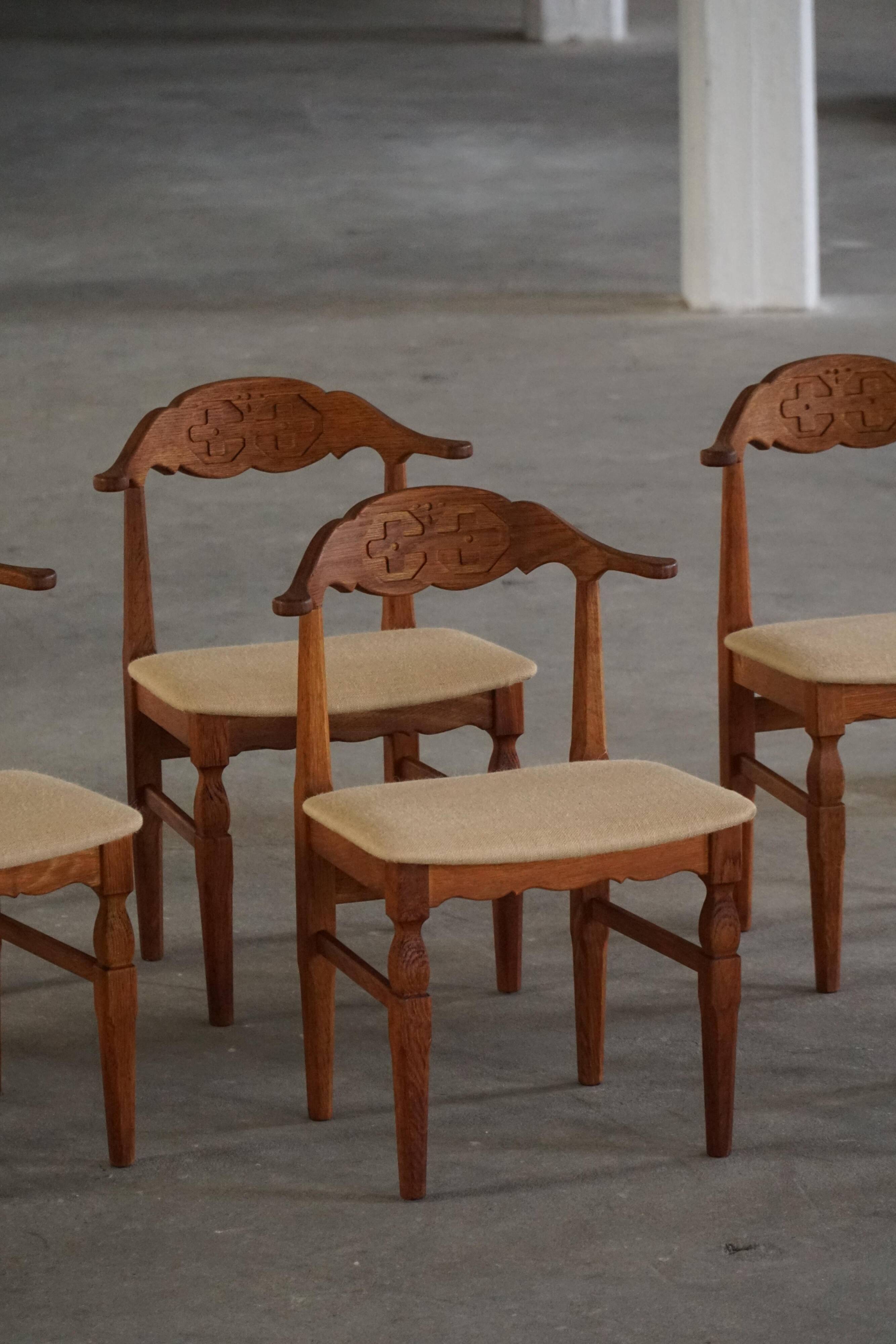 Henning Kjærnulf, set of 8 oak chairs with jute fabric, mid-century Danish, 1960s.
