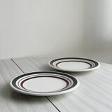 2 green and burgundy strip dessert plates.