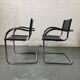 Pair of design armchairs in imitation leather chrome