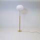 Mid-century floor lamp in brass and oak by Falkenbergs Belysning, Sweden, 1960s.