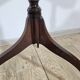 Antique octagonal mahogany side table on a classic tripod, 19th century.