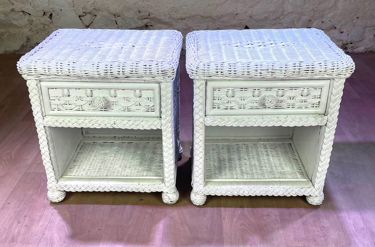 Pair of white lacquered rattan bedside tables