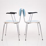 A pair of chairs with armrests, poland, 1970s