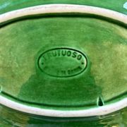 Fish dish in green earthenware