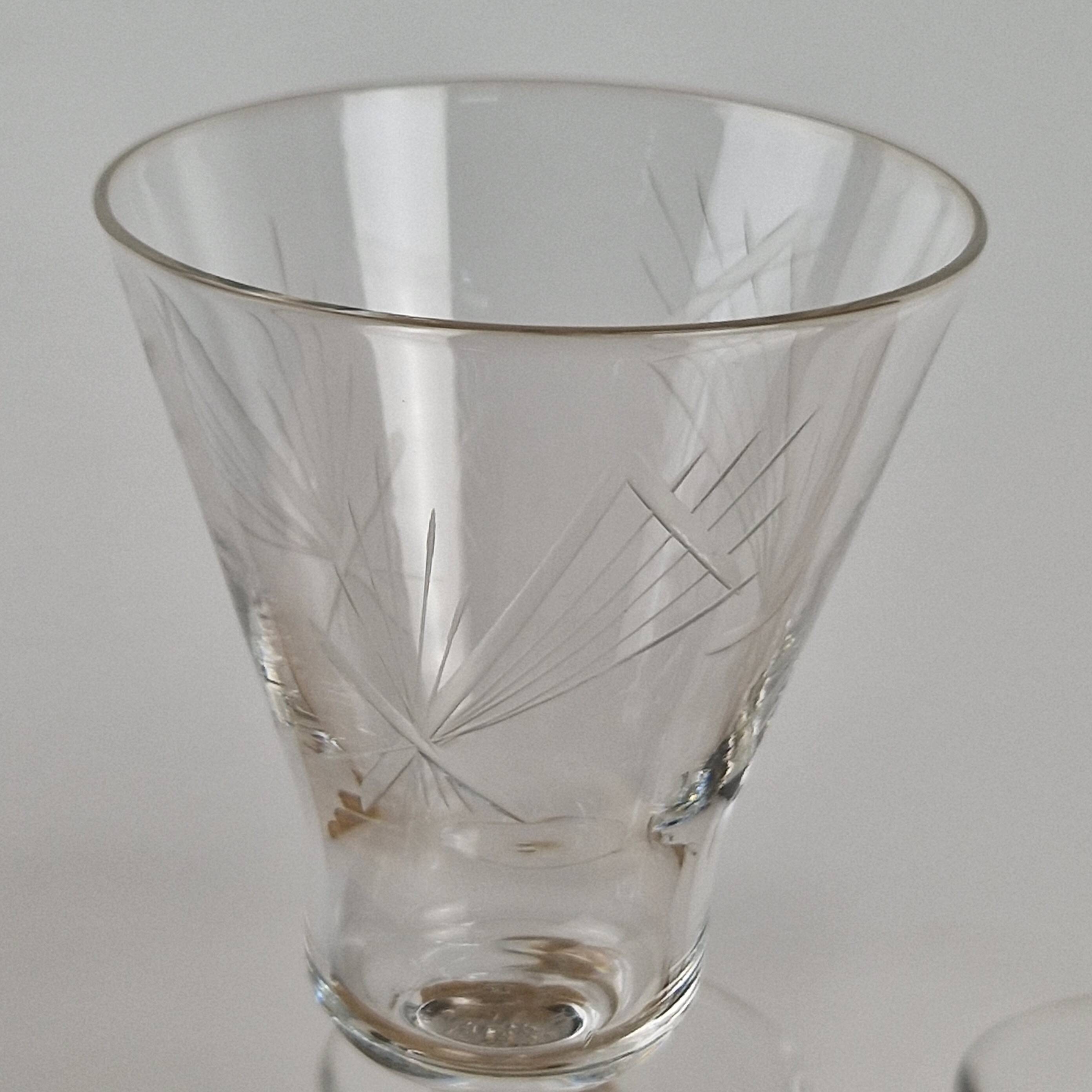 7 crystal footed glasses, antique white wine glasses.