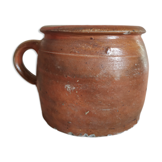 Glazed terracotta pot with a handle