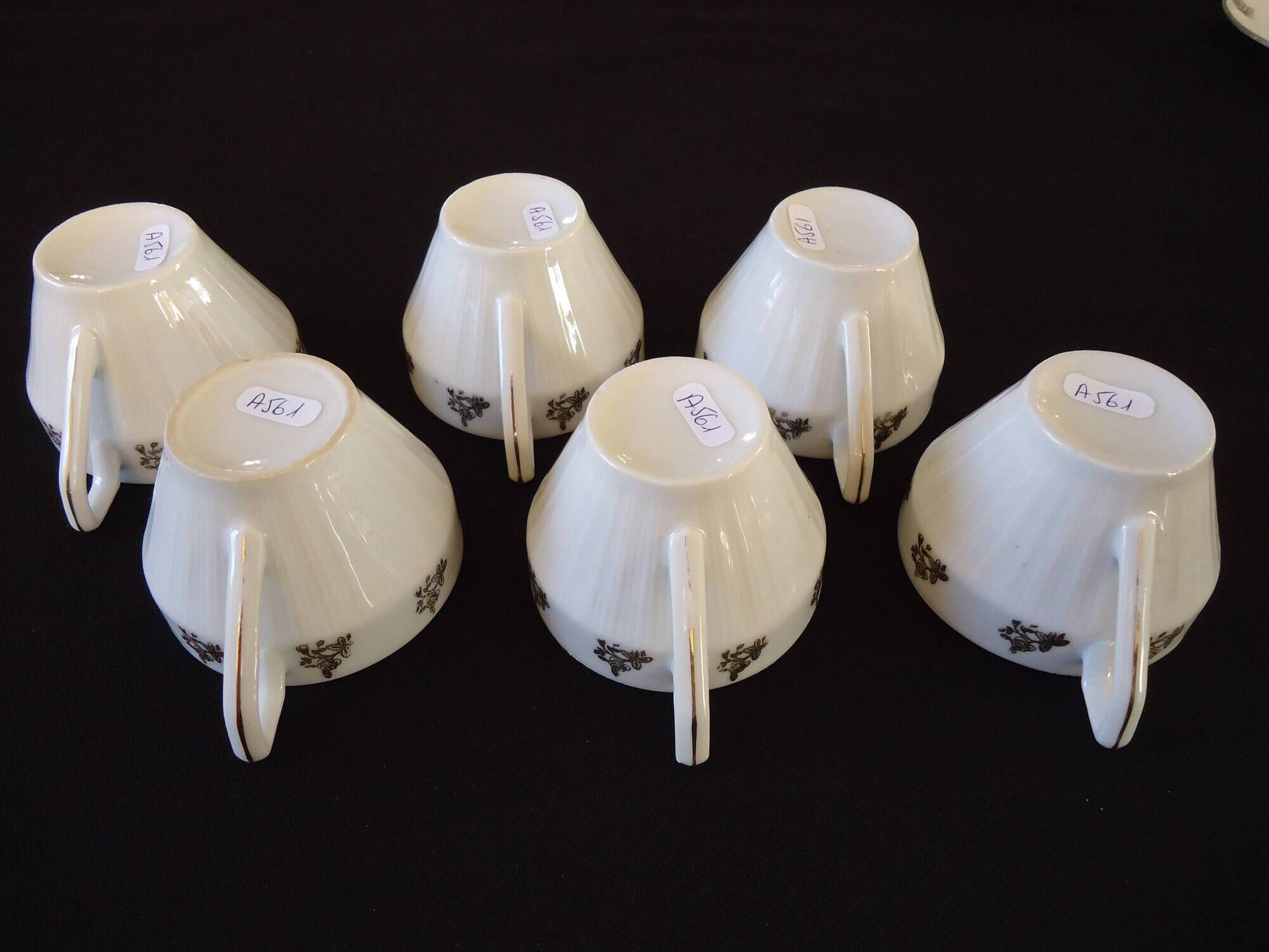 Set of six Art Deco white fine porcelain coffee cups and saucers