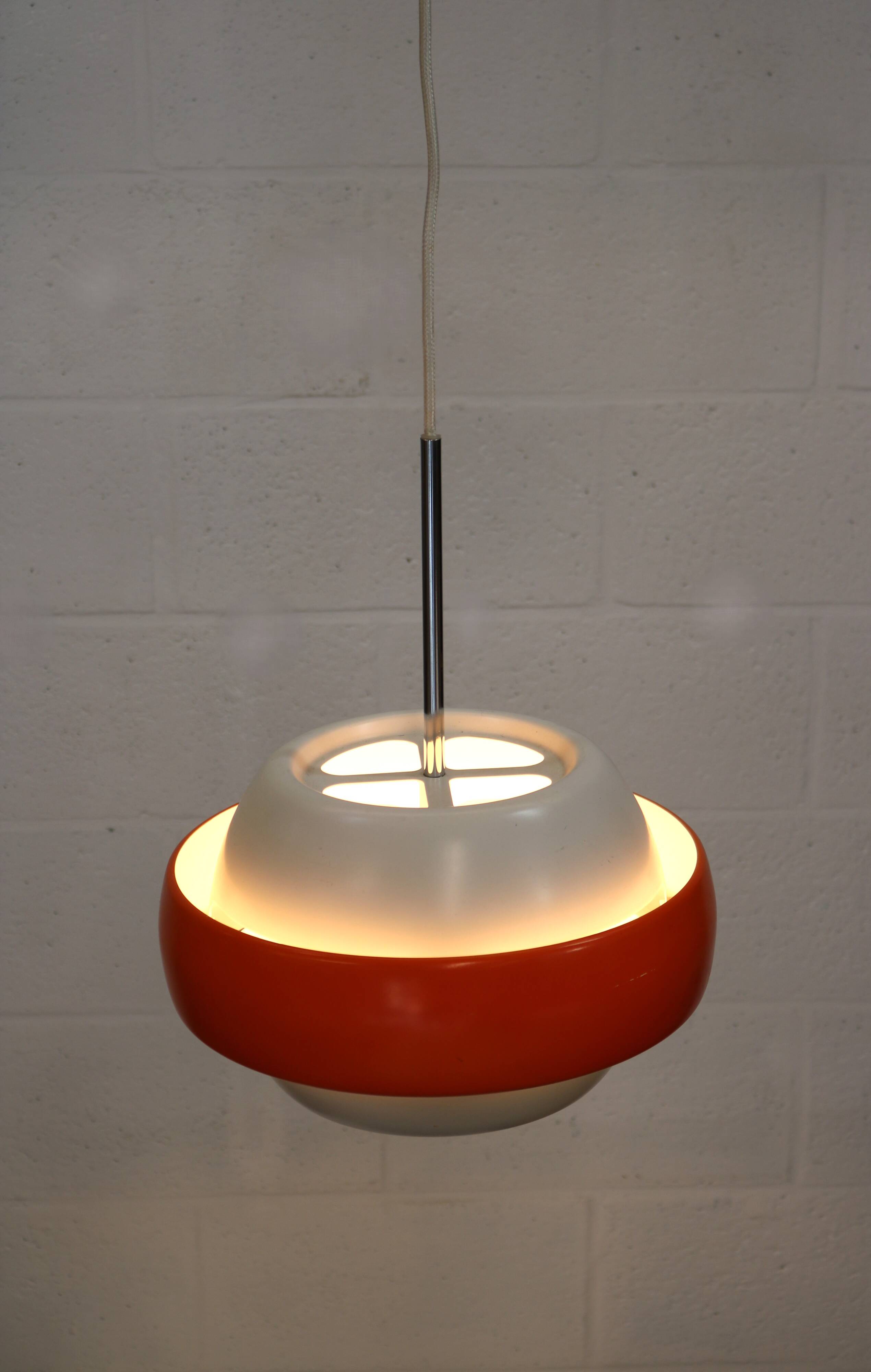 orange and white vintage lamp with chrome accent