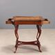 Small antique coffee table made of fruitwood and rosewood, 20th century.